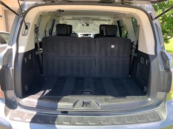 SUV rear cargo area and folded seats vacuumed clean